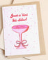 Greeting card with a pink cocktail glass and text on a beige background