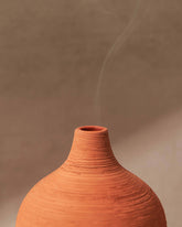 Close Up Moroccan Amber & Orris Root Textured Terracotta Candle