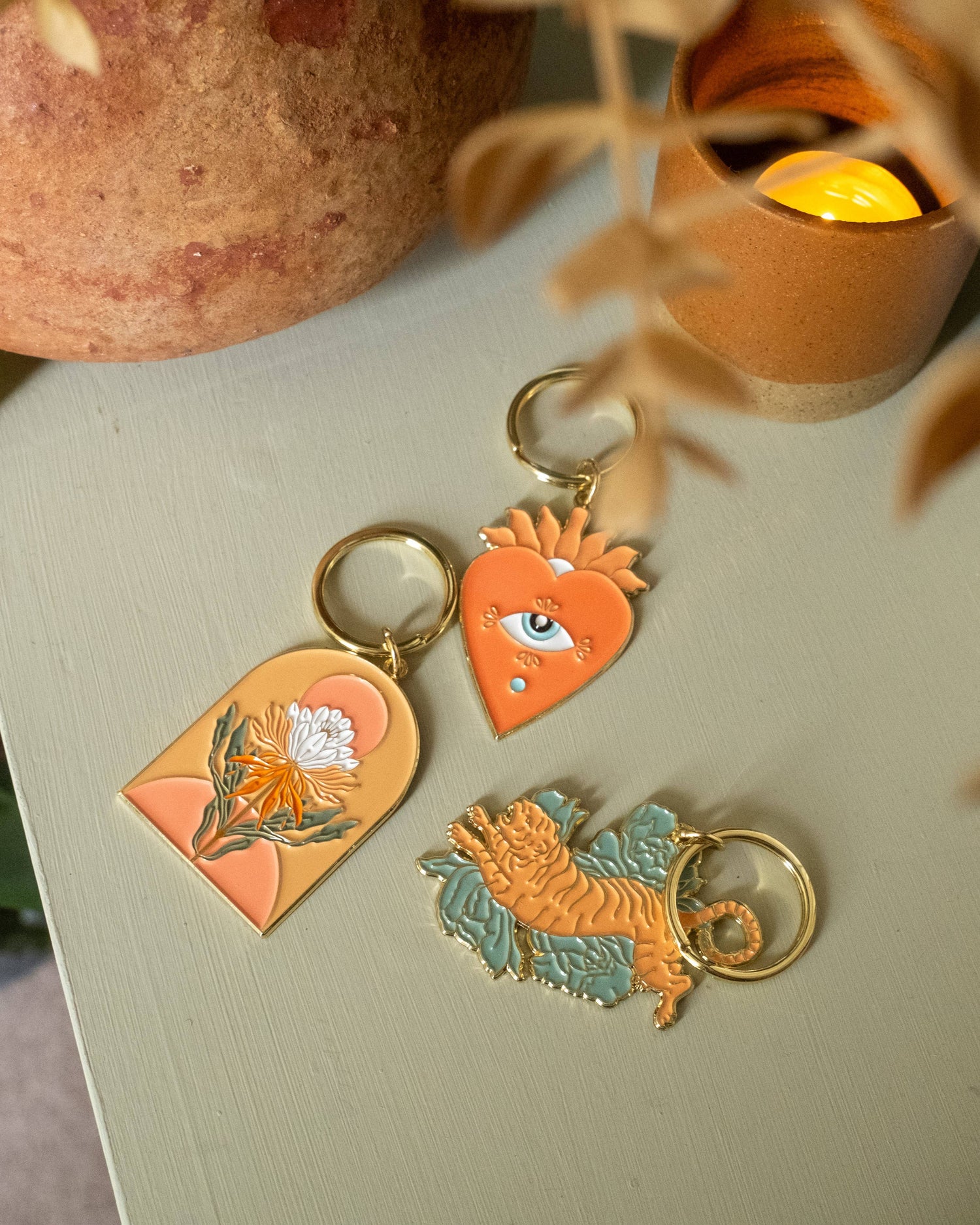 set on enamel keychains on table