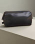 Vegan Leather Wash Bag in Black - Benny and Mollie