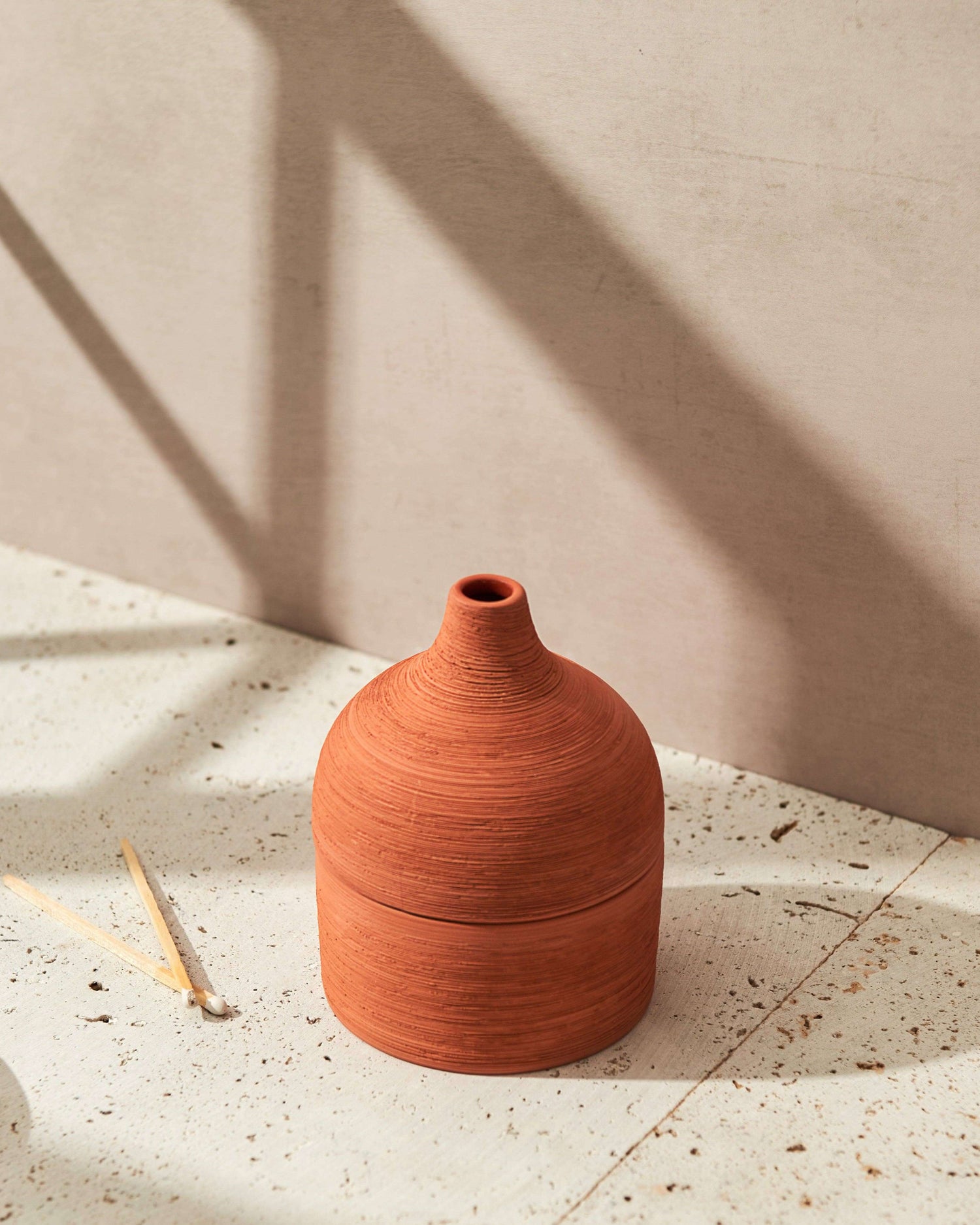 Moroccan Amber & Orris Root Textured Terracotta Candle on Table