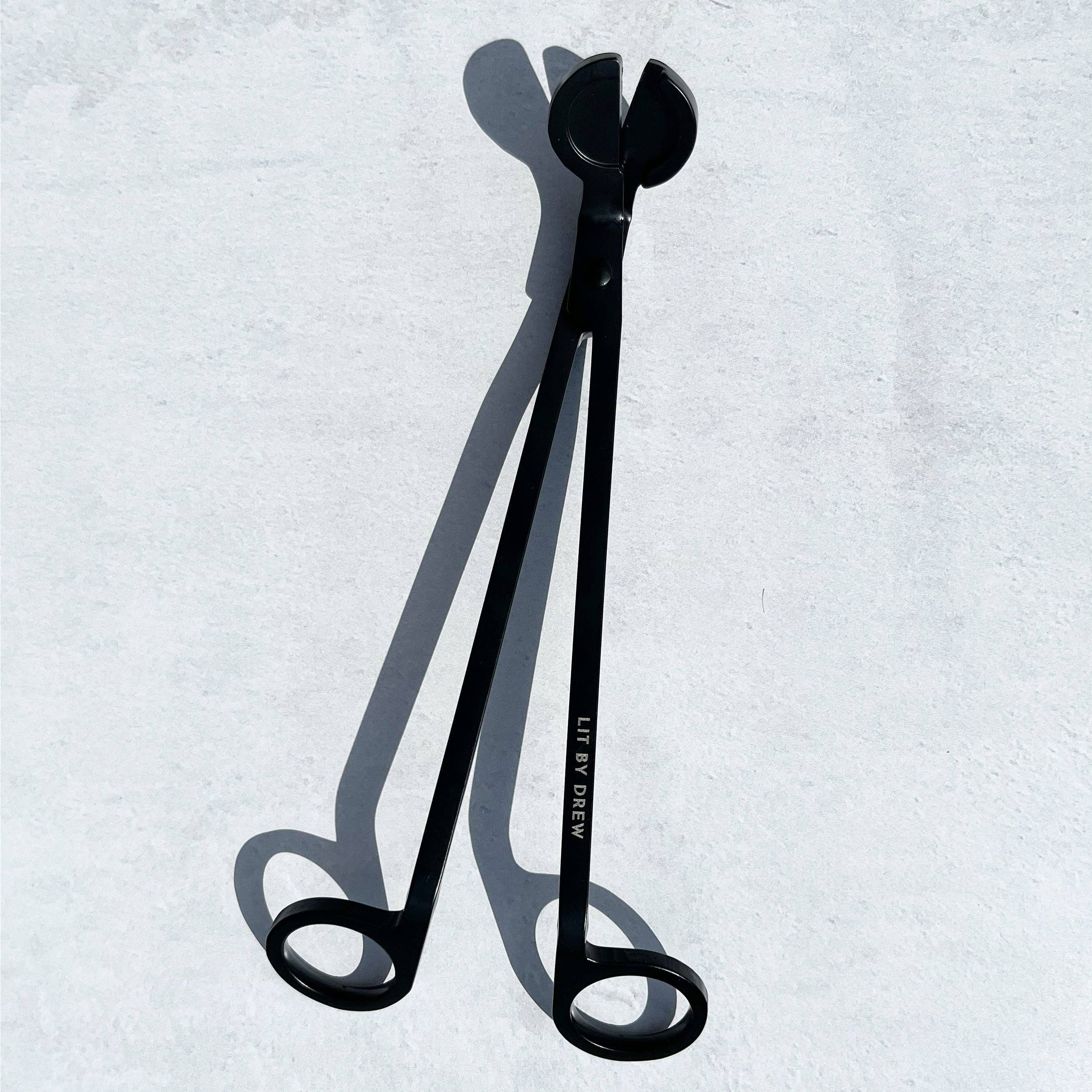 Black Candle Wick Trimmer for maintaining candle cleanliness and safety.