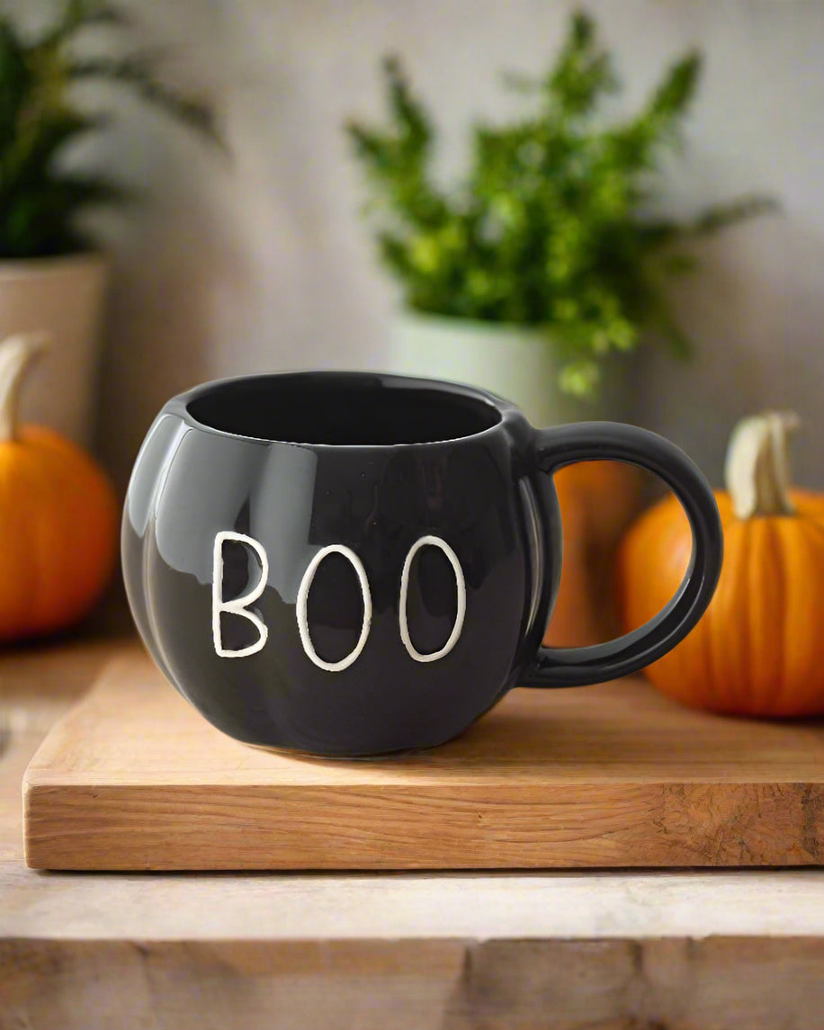 Black ceramic mug with a glossy finish and embossed “BOO” slogan. A fun addition to your autumn collection.