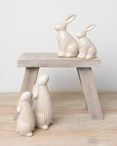ceramic bunnies with a ribbed reactive glaze finish in white/cream. Ideal for Easter or spring décor.