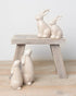 ceramic bunnies with a ribbed reactive glaze finish in white/cream. Ideal for Easter or spring décor.