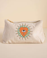 Stone-coloured medium corduroy pouch with a zip closure, featuring embroidered designs of a heart, eye, and sun. Fully lined for storing makeup, toiletries, or travel accessories.