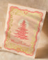A6 handmade eco-conscious card with soft pink hues and luxe gold foil detailing, featuring a Christmas tree design. Includes a Kraft envelope and biodegradable cello wrap.