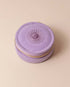 Lavender velvet polyester mini travel jewellery case with a zip closure and an embroidered sun design. Ideal for travel and jewellery storage.