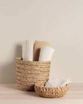 Handcrafted round bowl made from sustainable water hyacinth. A stunning eco-friendly home décor piece.