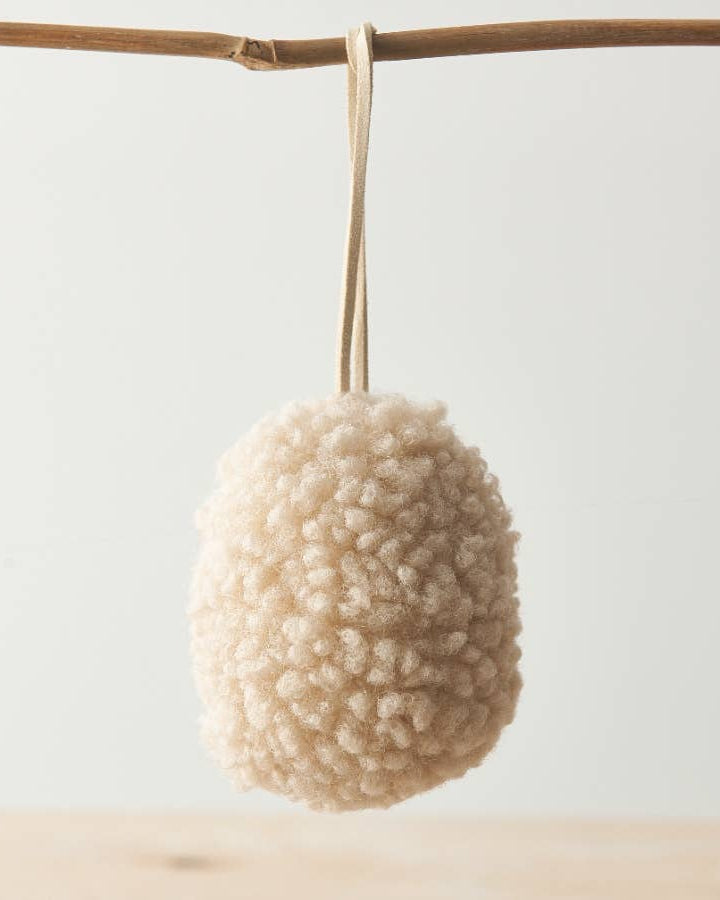 Set of three neutral hanging egg ornaments made from sherpa fabric with jute string. Perfect for Easter decoration.