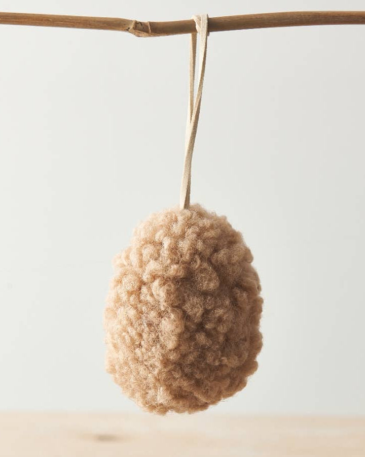 Set of three neutral hanging egg ornaments made from sherpa fabric with jute string. Perfect for Easter decoration.