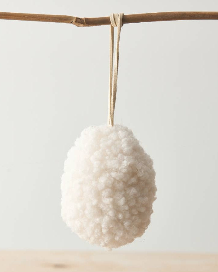 Set of three neutral hanging egg ornaments made from sherpa fabric with jute string. Perfect for Easter decoration.