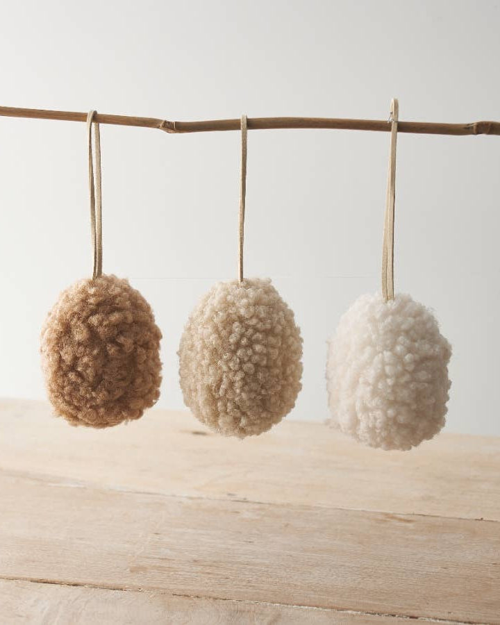 Set of three neutral hanging egg ornaments made from sherpa fabric with jute string. Perfect for Easter decoration.