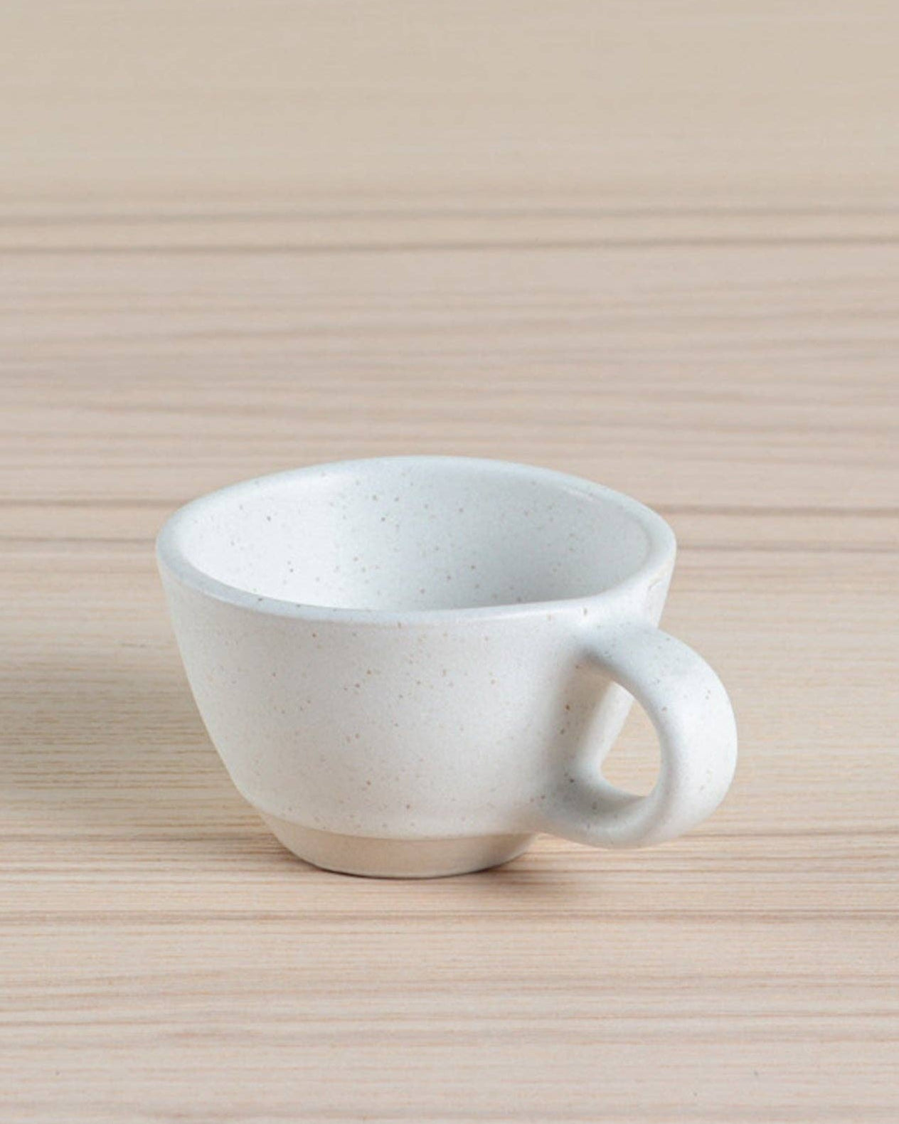 Set of two eco-friendly Juco fringe coasters crafted from sustainable materials. Perfect for protecting surfaces with style.