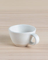 Set of two eco-friendly Juco fringe coasters crafted from sustainable materials. Perfect for protecting surfaces with style.