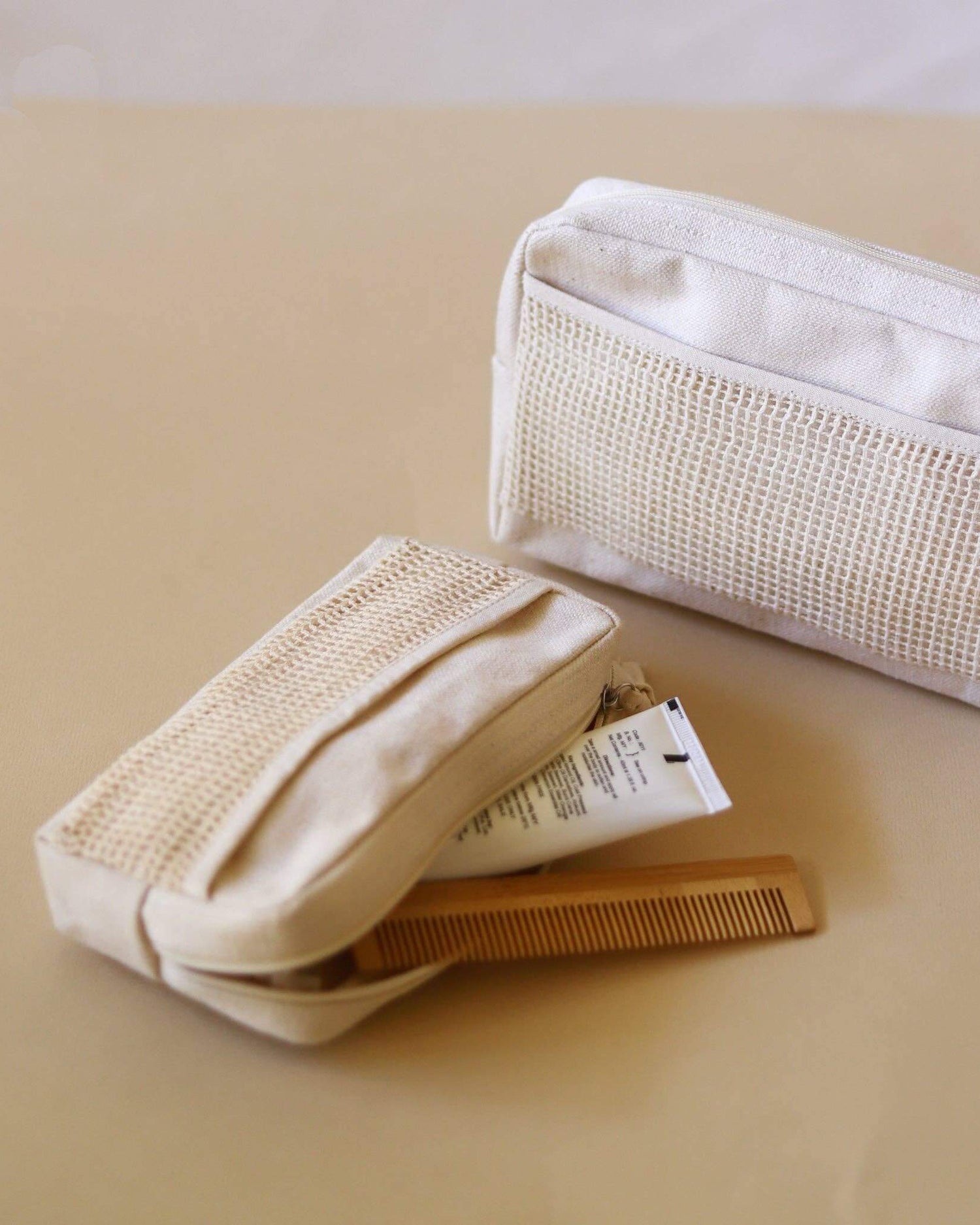 Eco-friendly, handmade Organic Pouch made from organic fabric with a delicate netting detail. Versatile and sustainable.
