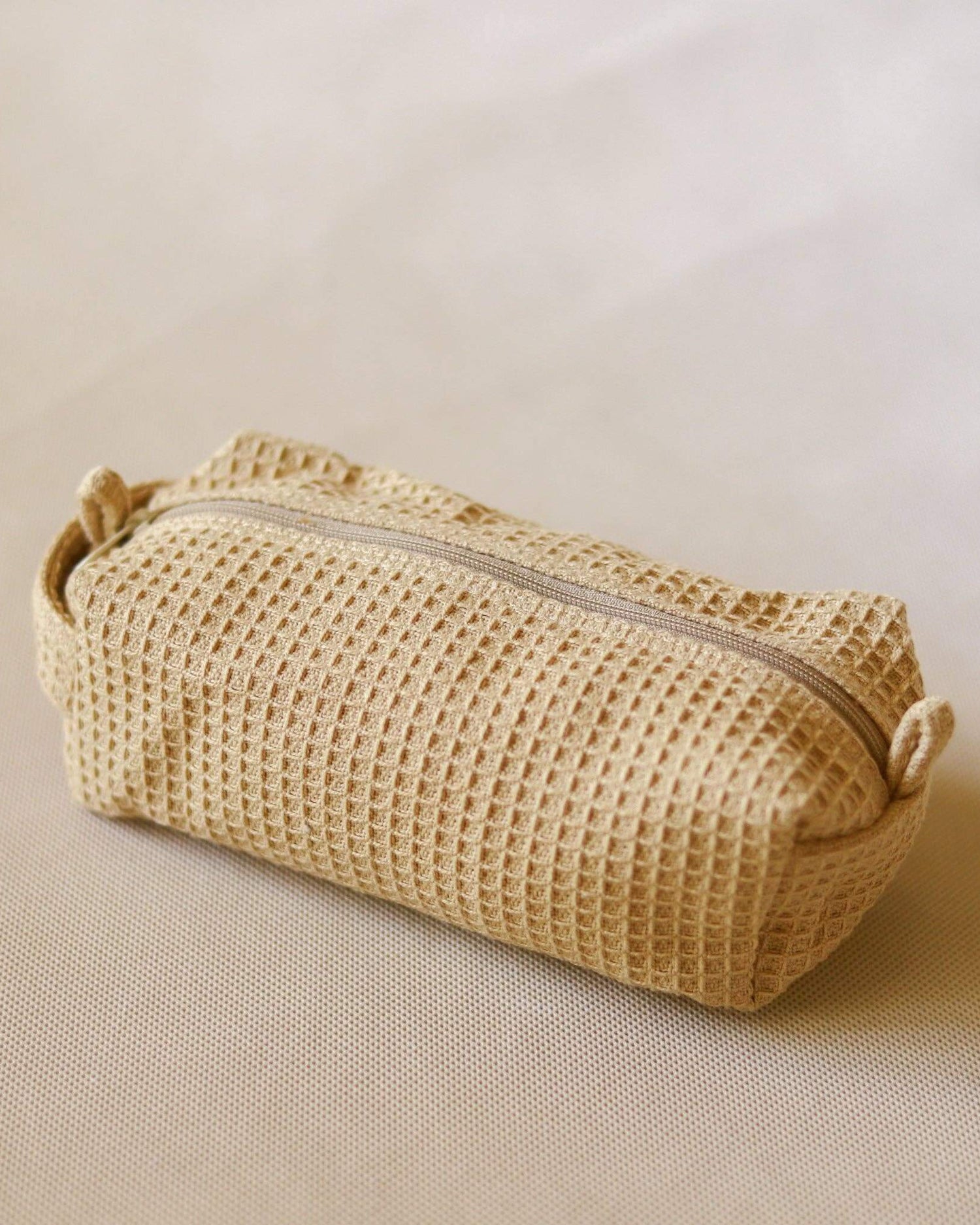 Handmade, eco-friendly Organic Toast Waffle Pouch crafted from organic fabric. Ideal for home décor or storage.