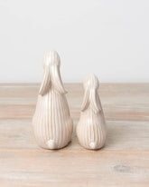 Standing ceramic bunny with a ribbed reactive glaze finish in white/cream. Ideal for Easter or spring décor.