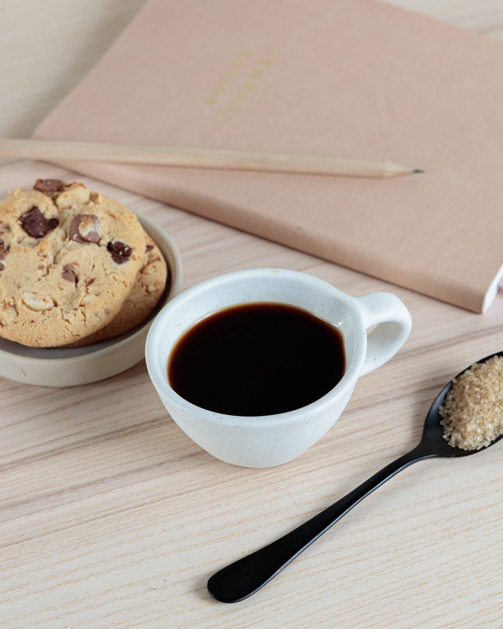 Set of two eco-friendly Juco fringe coasters crafted from sustainable materials. Perfect for protecting surfaces with style.