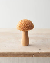 Set of three autumnal ornaments featuring sherpa fabric mushrooms with a natural, seasonal charm.