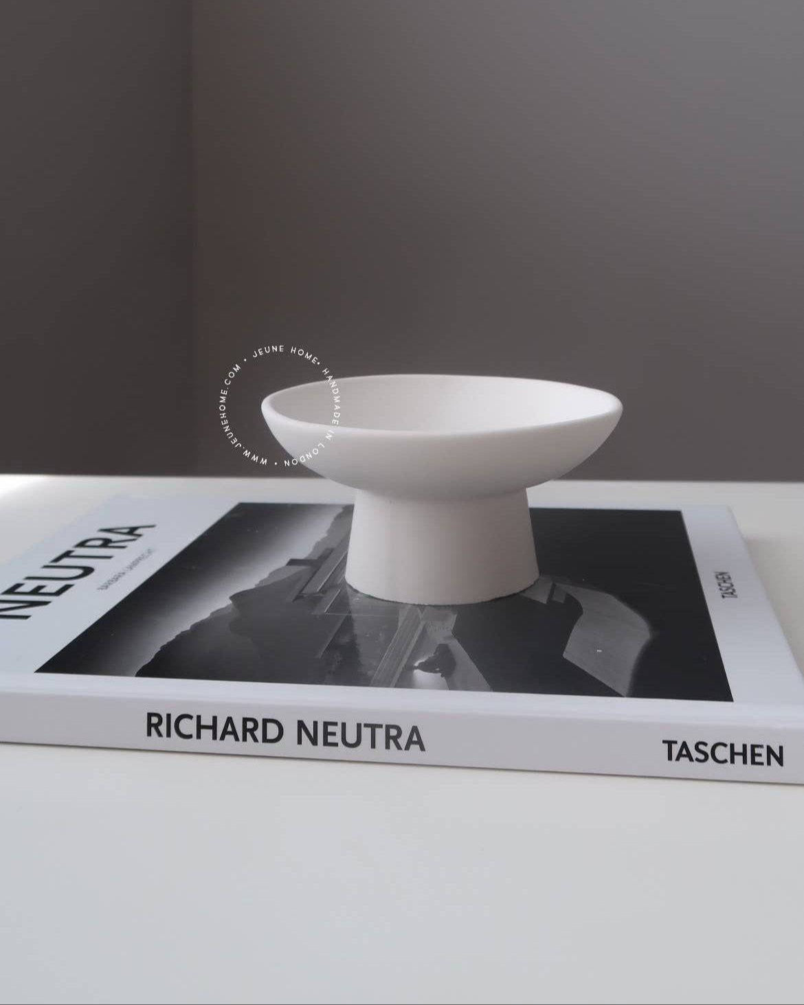 Tasai pedestal bowl, a handcrafted minimalist masterpiece made from eco-friendly resin.