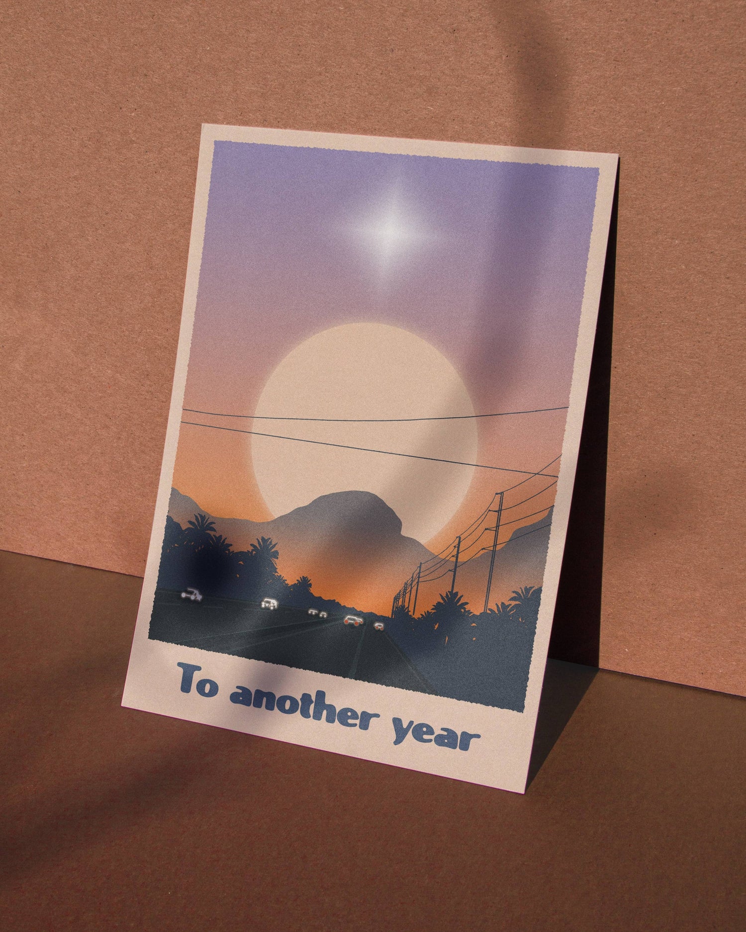 A6 eco-friendly card with "To Another Year" text, depicting a city and mountain scape. Ideal for anniversaries, birthdays, New Year&