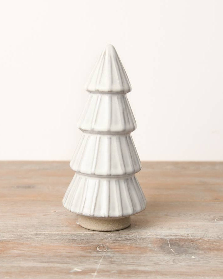 White ceramic tree ornament with a reactive glaze finish. An elegant addition to any minimalist or modern Christmas decor.