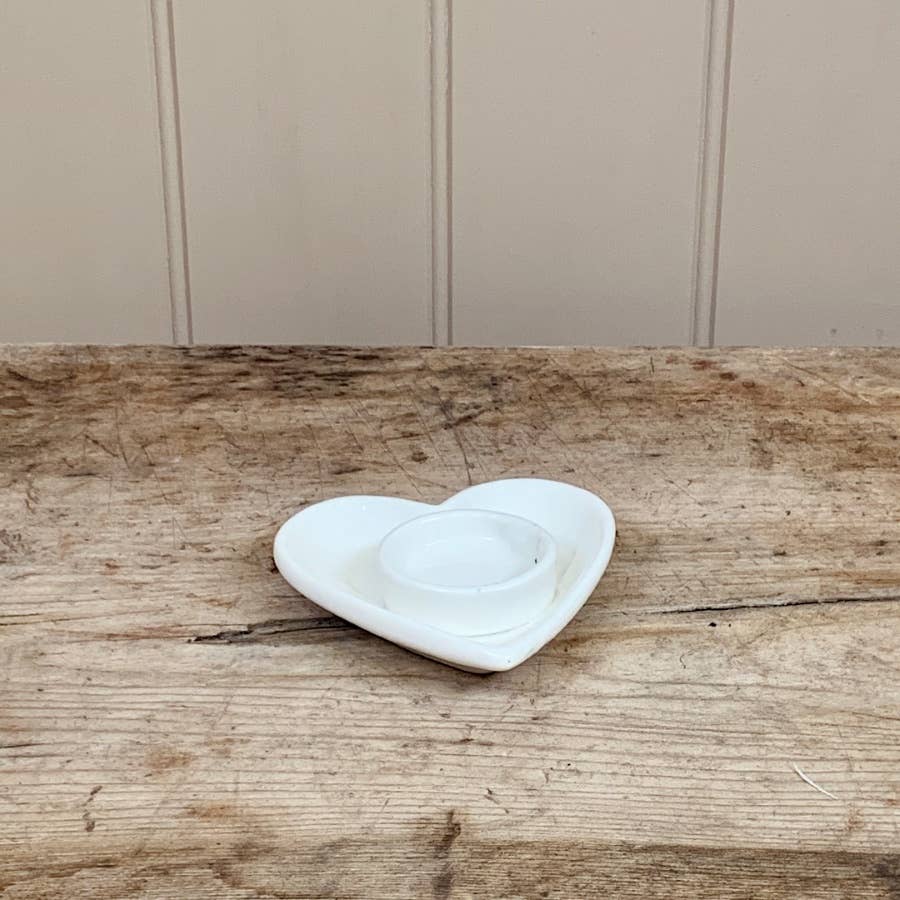 Minimalist ceramic heart-shaped tea light holder. A perfect addition for Valentine’s Day, Mother’s Day, or home décor.