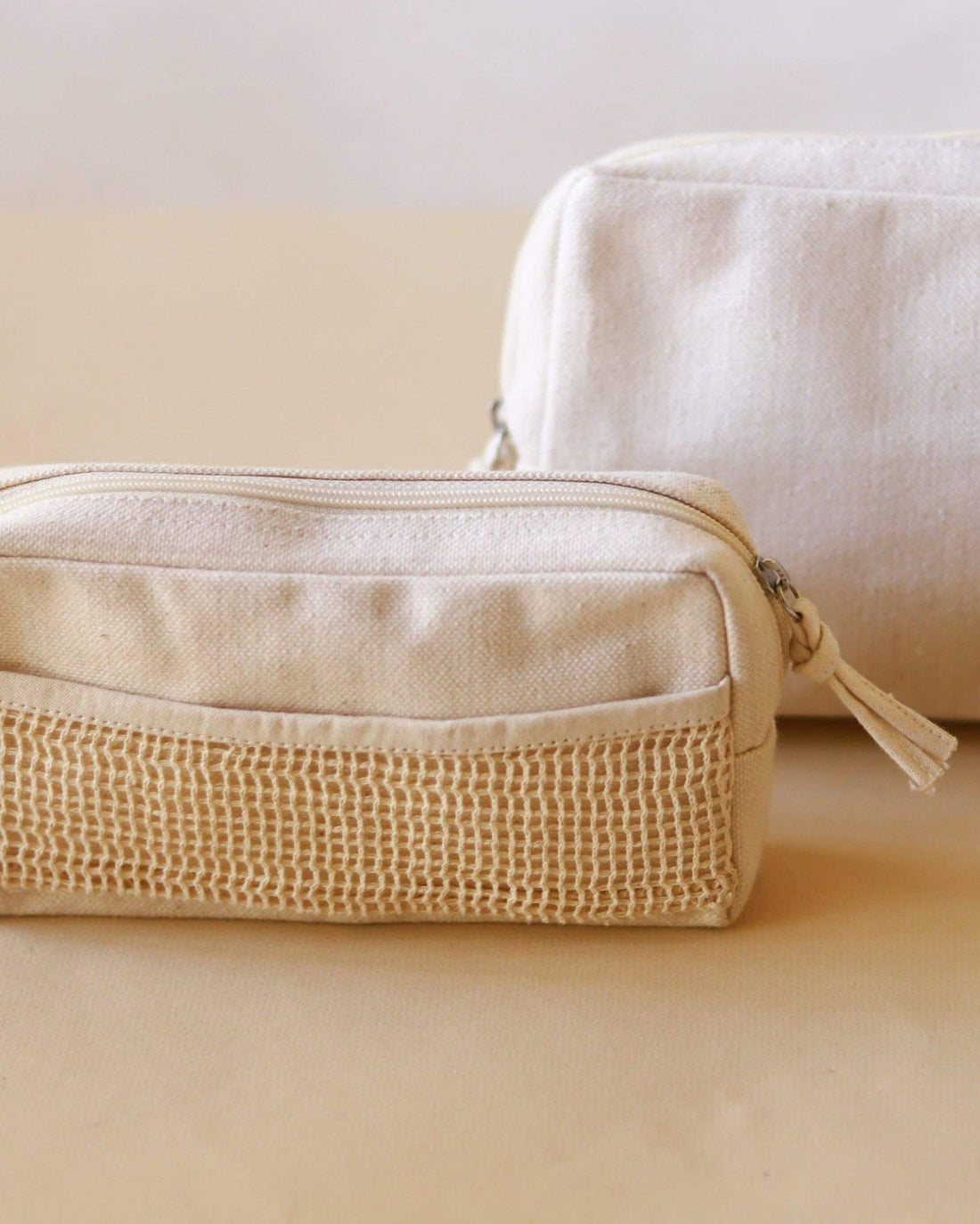 Eco-friendly, handmade Organic Pouch made from organic fabric with a delicate netting detail. Versatile and sustainable.