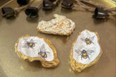 natural back, oyster shell trinket dish featuring two bumble bees, crafted using a meticulous decoupage technique with hand-painted gold edges, perfect for spring jewellery storage or home decor.