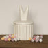 Ceramic storage pot featuring cute bunny ears. A delightful Easter décor piece.