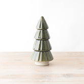 Green ceramic Christmas tree ornament with a reactive glaze finish, adding a festive and sophisticated touch to seasonal decorations.