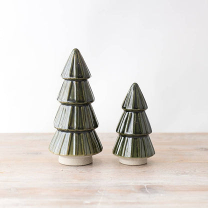 Green ceramic Christmas tree ornament with a reactive glaze finish, adding a festive and sophisticated touch to seasonal decorations.