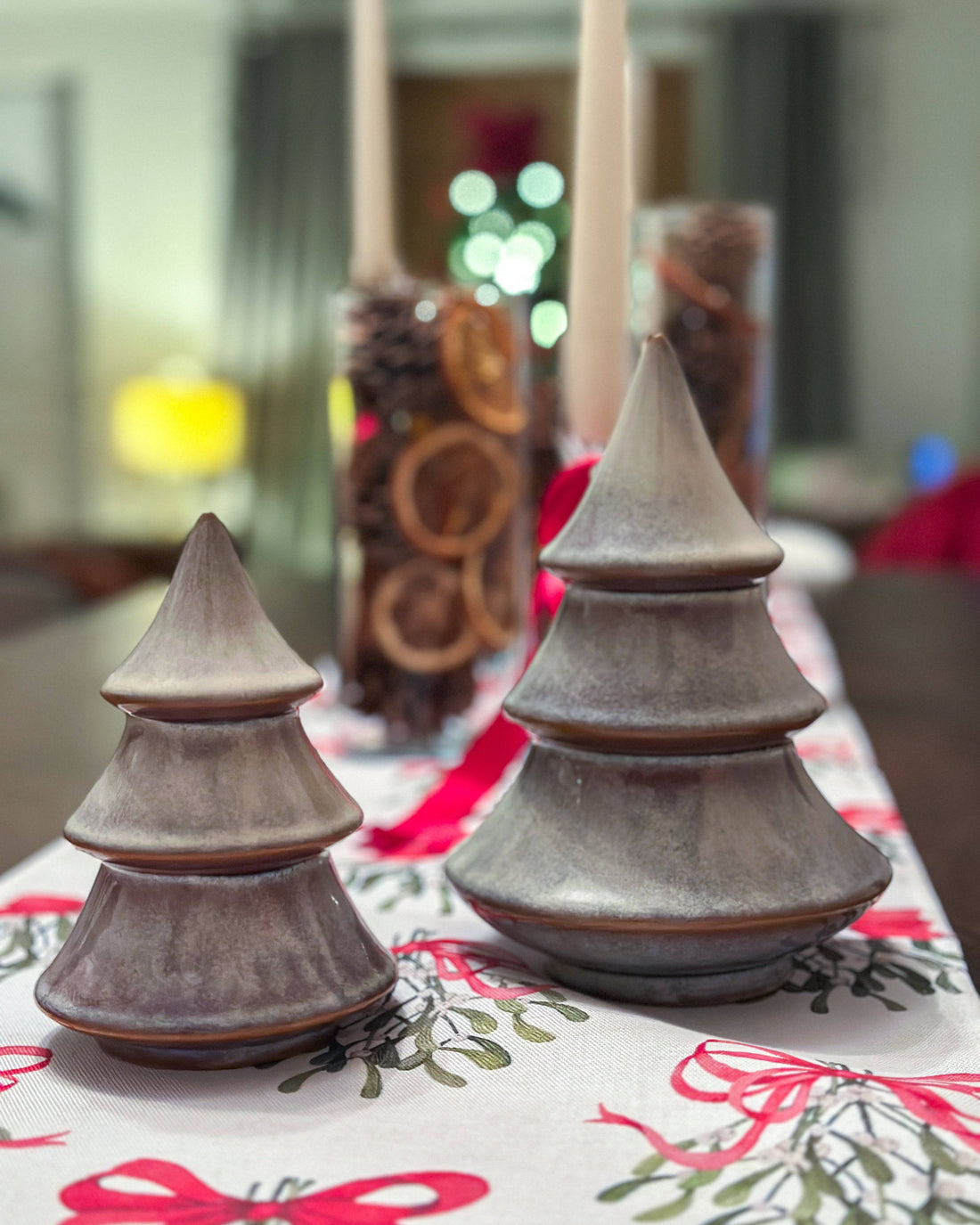 Porcelain Christmas tree ornament with a layered design and reactive glaze. Hand-finished and festive.
