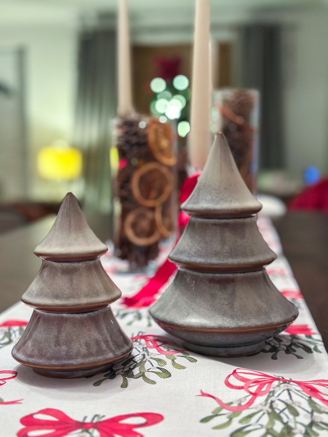 Porcelain Christmas tree ornament with a layered design and reactive glaze. Hand-finished and festive.