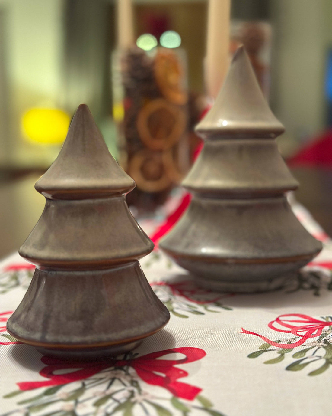 Porcelain Christmas tree ornament with a layered design and reactive glaze. Hand-finished and festive.