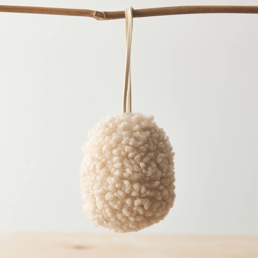 Set of three neutral hanging egg ornaments made from sherpa fabric with jute string. Perfect for Easter decoration.