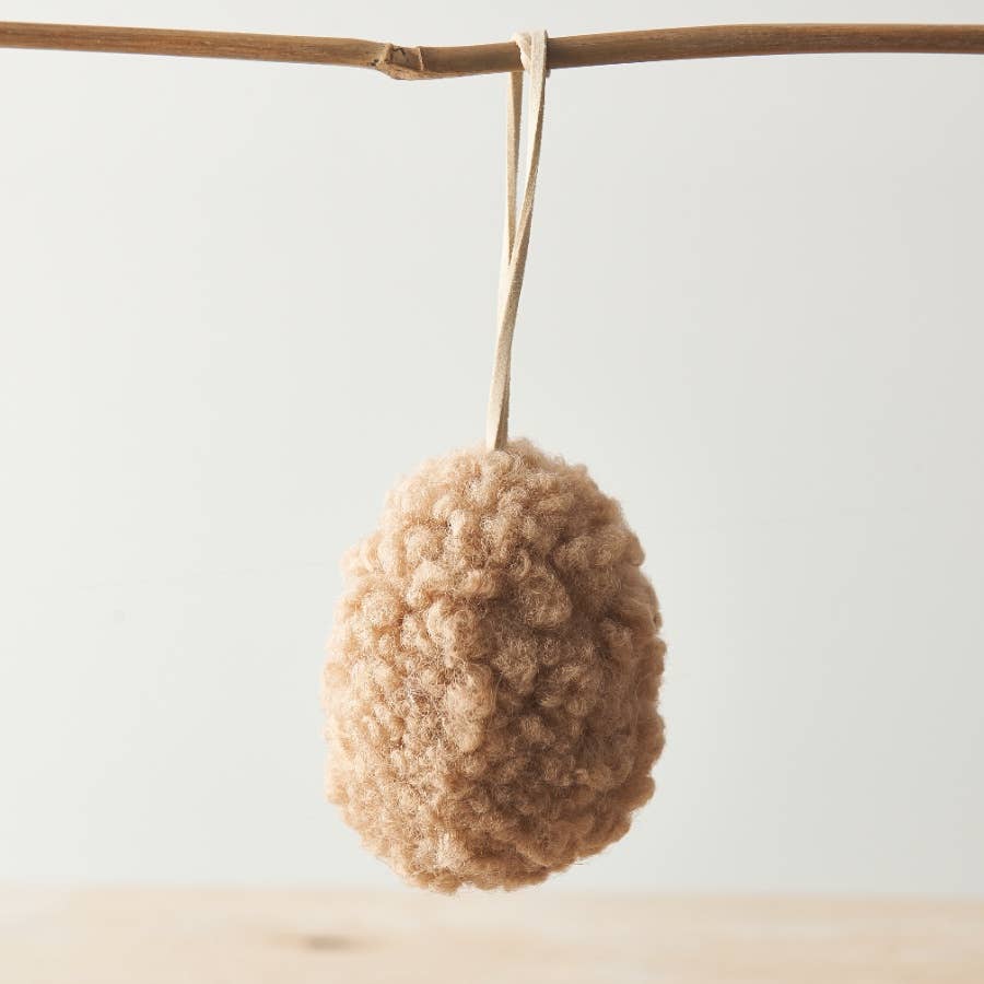 Set of three neutral hanging egg ornaments made from sherpa fabric with jute string. Perfect for Easter decoration.