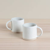 Handmade ceramic Organic Classic Mug in oatmeal, crafted using traditional hand-throwing and dipping techniques. Perfect for everyday use.