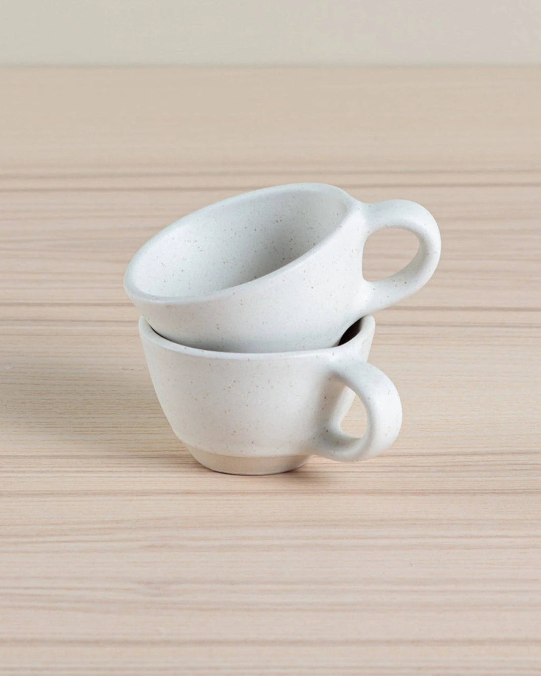 Set of two eco-friendly Juco fringe coasters crafted from sustainable materials. Perfect for protecting surfaces with style.