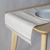 Eco-friendly table runner handcrafted from sustainable Juco fabric. A beautiful addition to your home textiles collection.