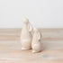 Standing ceramic bunny with a ribbed reactive glaze finish in white/cream. Ideal for Easter or spring décor.