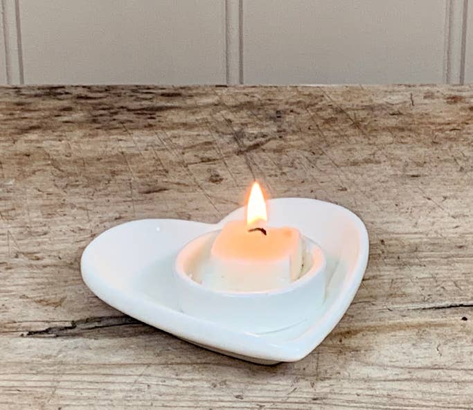 Minimalist ceramic heart-shaped tea light holder. A perfect addition for Valentine’s Day, Mother’s Day, or home décor.