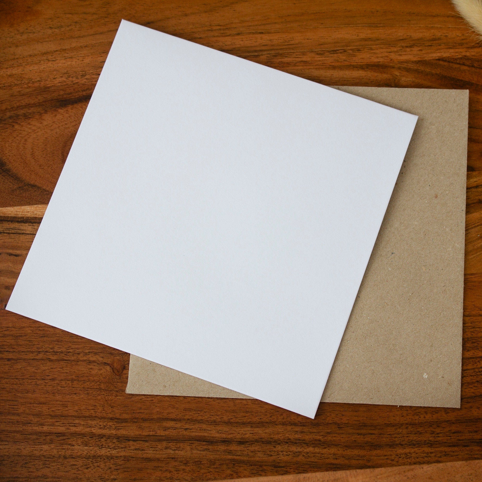 Kraft and white envelopes placed on a table